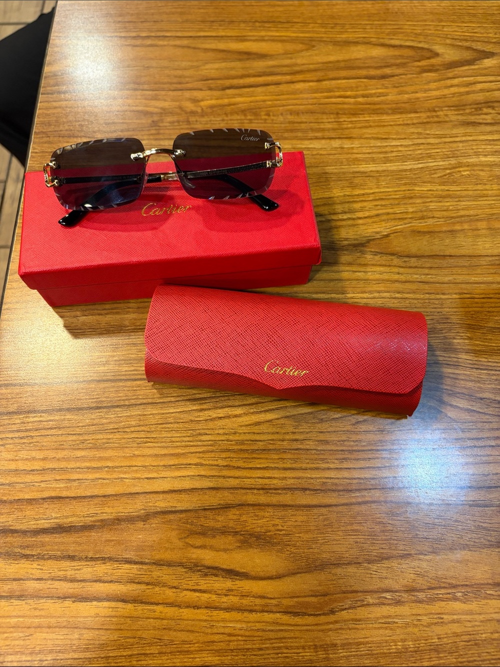 Cartier Women's Rimless Sunglasses with Brown Gradient Lenses and Gold Accents